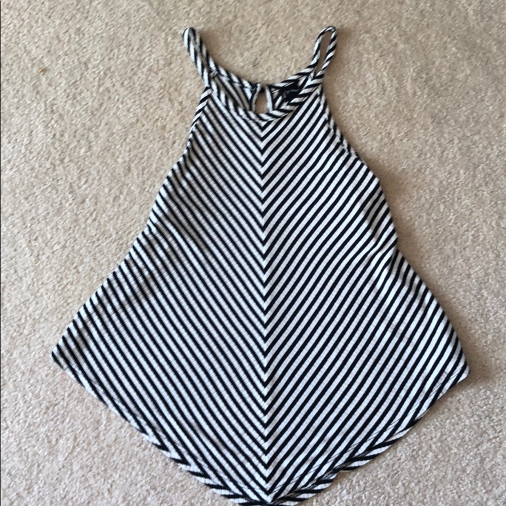 A striped tank top that flares at the end